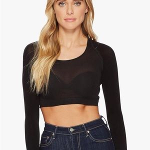 Spanx arm tights can be worn alone, over a tank top or under a sweater.